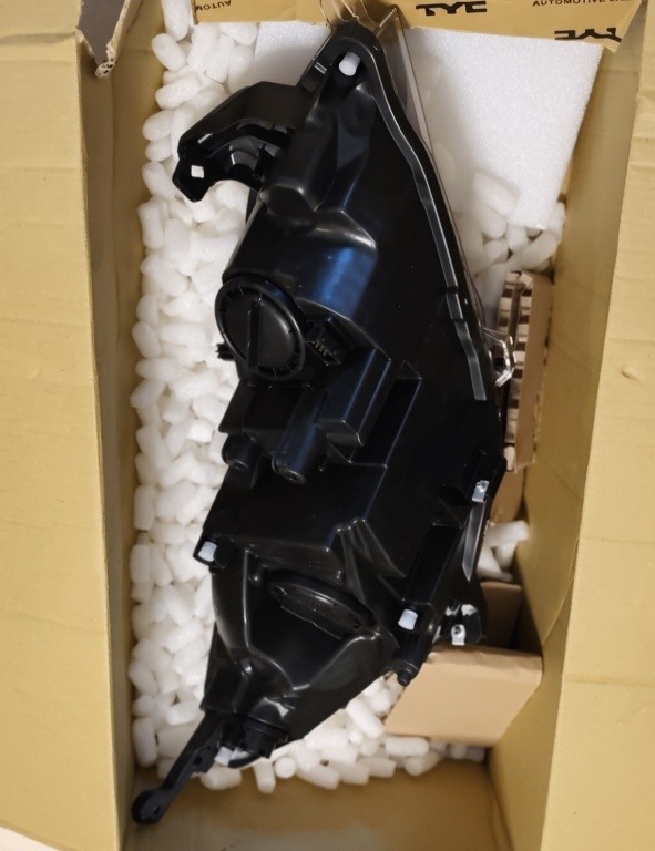 REFLEKTOR LAMPA LEWA Z SILNIKIEM ELEKTRYCZNYM 20-12190-25-2 TYC. Opel Astra J - poliftowy